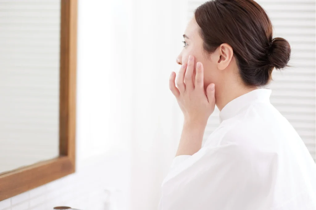 woman considering how often to exfoliate to avoid over exfoliated skin